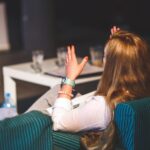 behind-of-woman-gesturing-6385