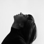 female-grayscale-photo-facing-upward-972325