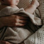 woman-carrying-a-baby-3242264 (1)