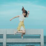 jumpshot-photography-of-woman-in-white-and-yellow-dress-near-884977